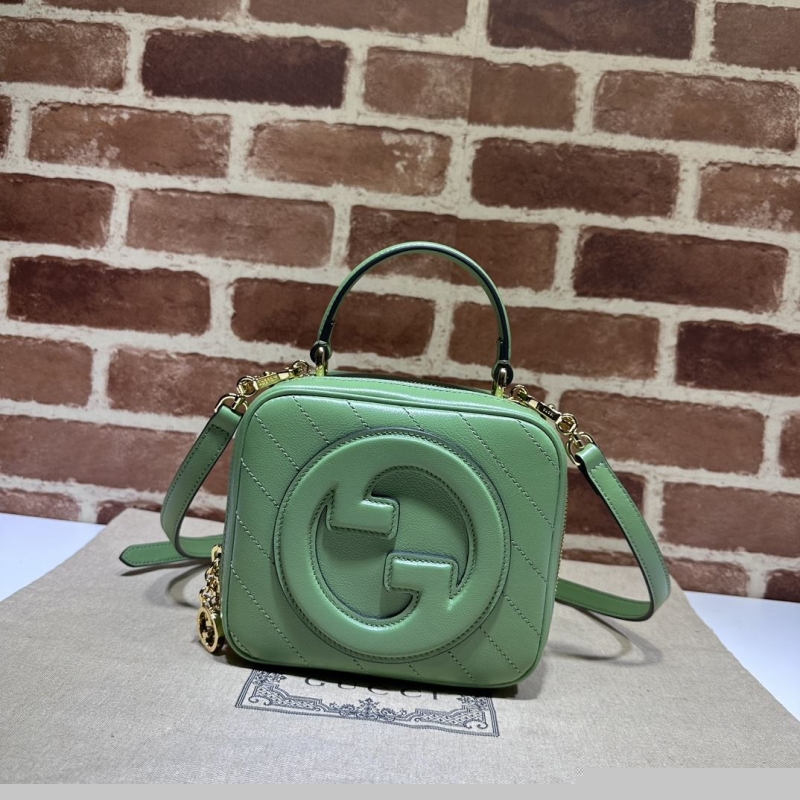 G*u*i top handle bags